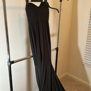 Long black gown. Large train. Large split. Medium. Worn once. Perfect condition